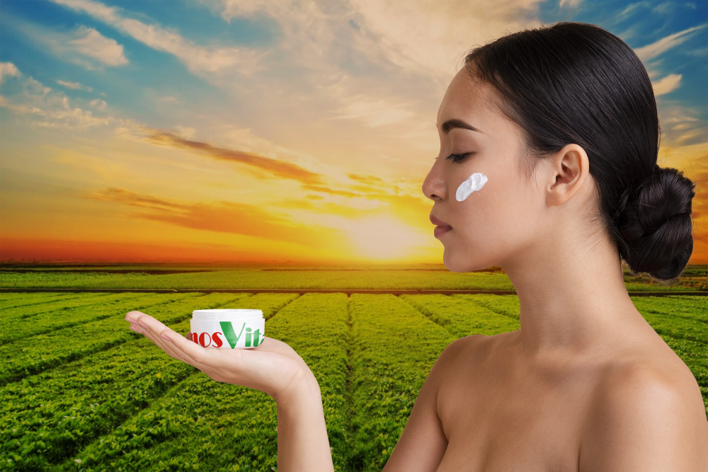 Side view woman holding a skin lotion mock-up